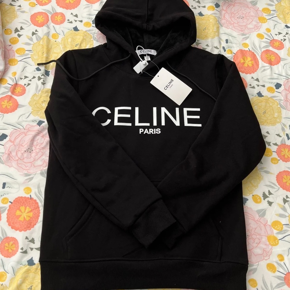 Selling this hoodie Celine size medium but runs small..